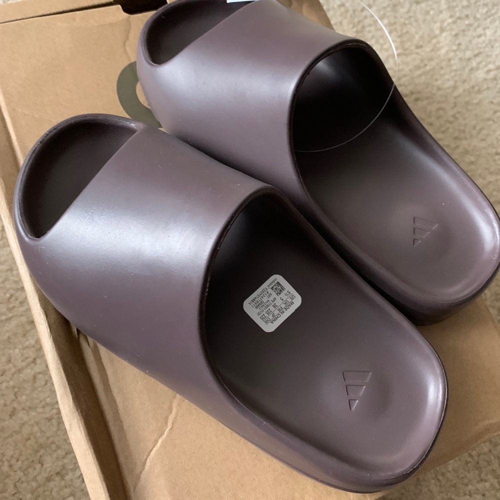 Yeezy slides size 5.5 in women in soot color.
